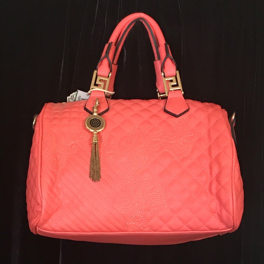 Coral colored hand bag